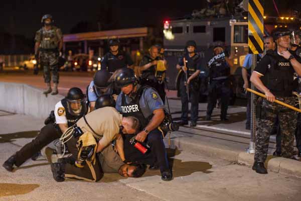 'AA reporter in Ferguson suffered trauma, med report says'