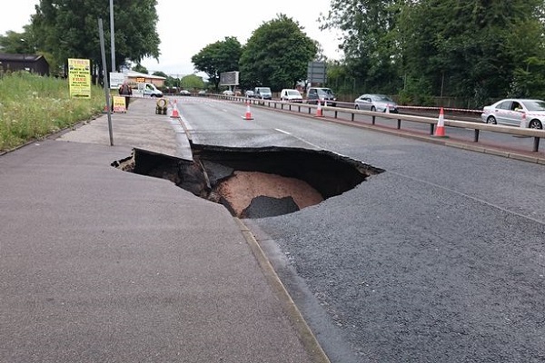 The Mancunian Way whole, the 40 ft crater impede the life of the people