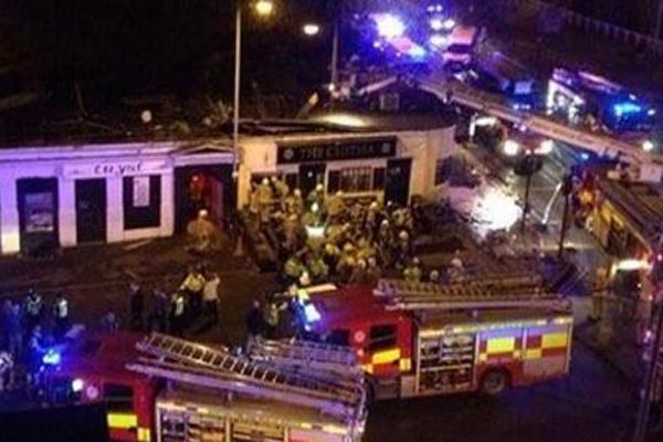 Police helicopter crashes into Scottish pub