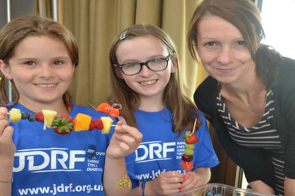 Local children give diabetes worries the boot‏