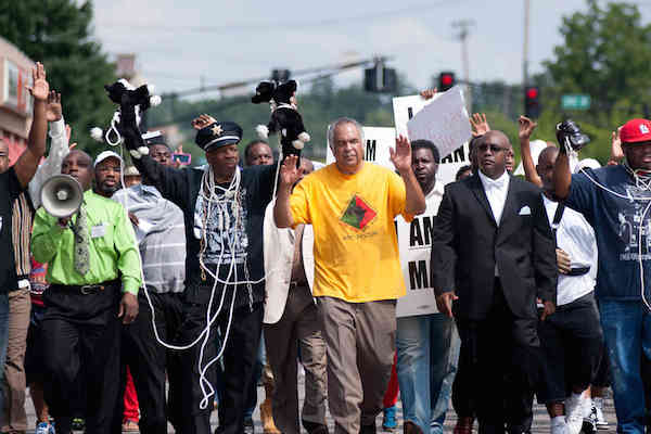 US - Demonstrators march on Ferguson Police Department