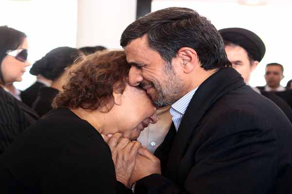 Iran President Ahmadinejad's raises eyebrows with behavior at Chavez funeral