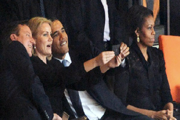 David Cameron defends 'selfie' at Mandela service