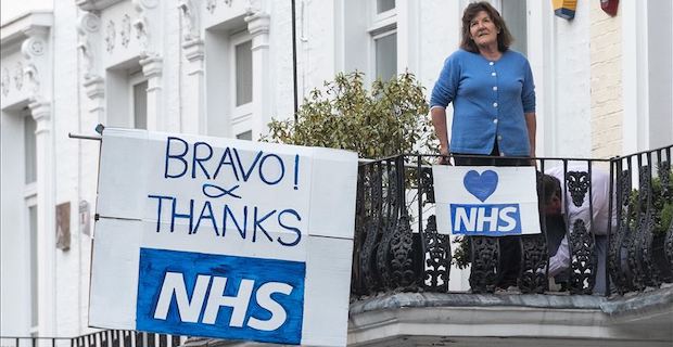 UK holds minute's silence for lost health workers