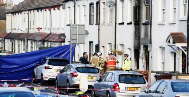 Woman arrested after four children die in London house fire