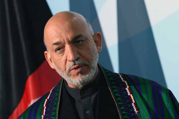 Kerry, Karzai extend talks on Afghan-US pact