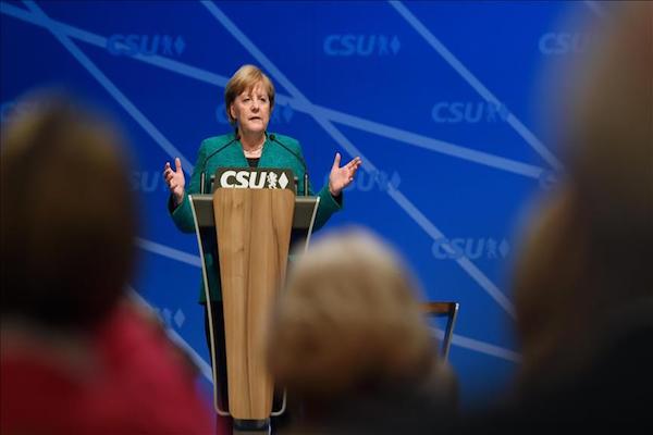 Chancellor Angela Merkel, SPD agree on timetable for coalition talks
