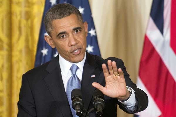 Obama says US won't act alone on Syria