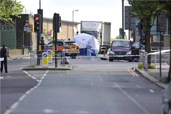 Britain left aghast by daylight street murder