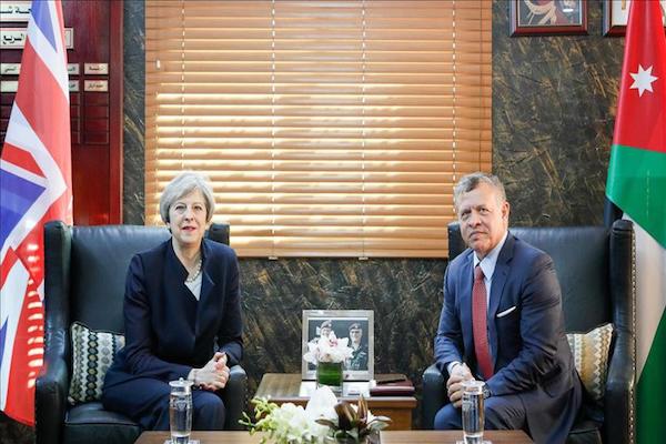 Minister Theresa arrives in Jordan, meets King Abdullah II