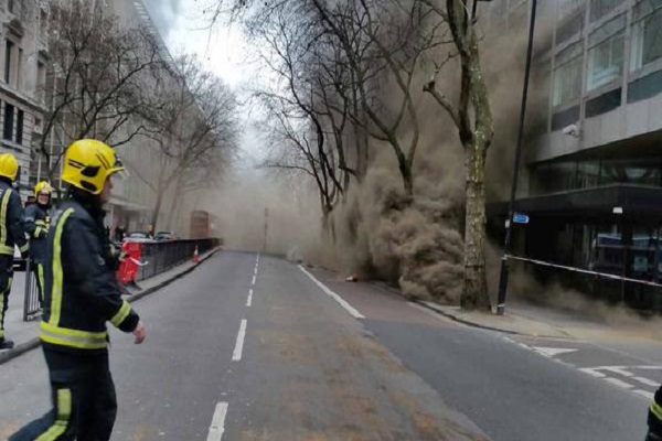 The fire began among cables in a service tunnel under the pavement of Kingsway