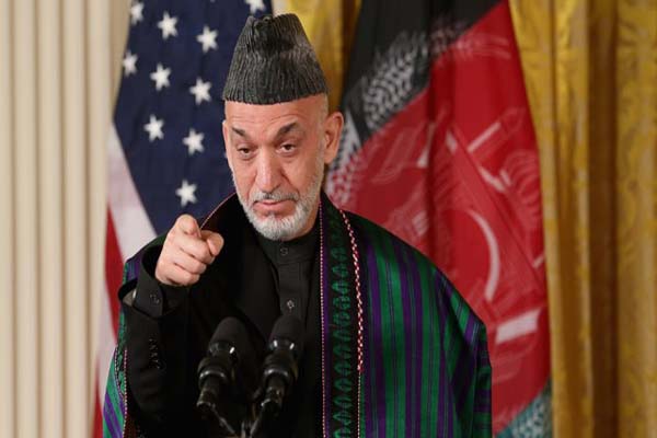 Karzai, 'US must stop their raids on our houses'