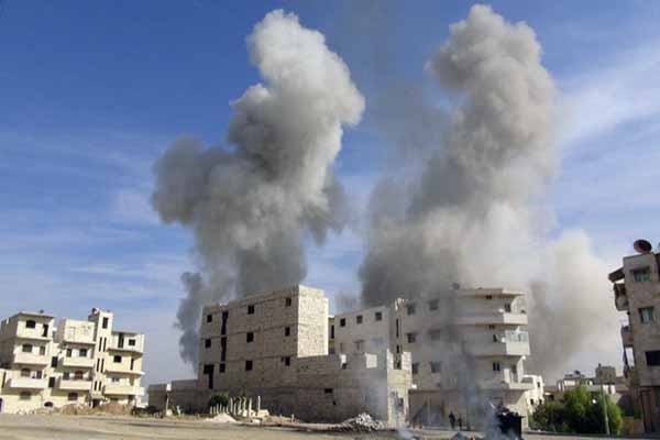 Assad forces bomb besieged town