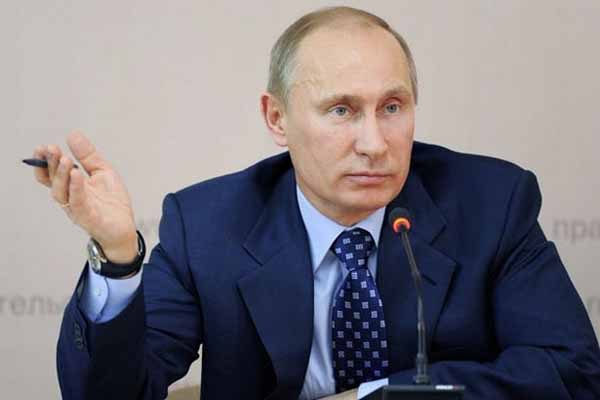 Putin warns against military intervention in Syria