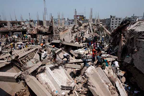 Bangladesh factory building collapse kills nearly 100
