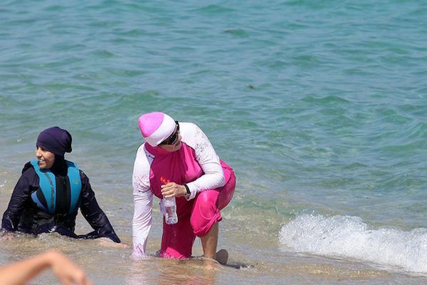 Several French mayors defying top court's burkini ruling