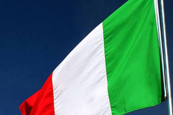 Italy president pledges to stay to deal with crisis