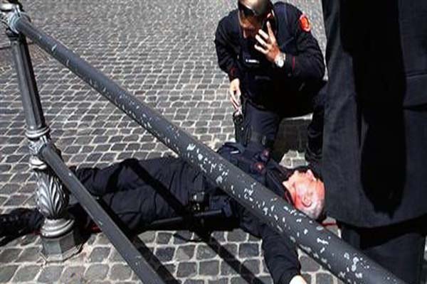 Two police officers shot as Italian government sworn in
