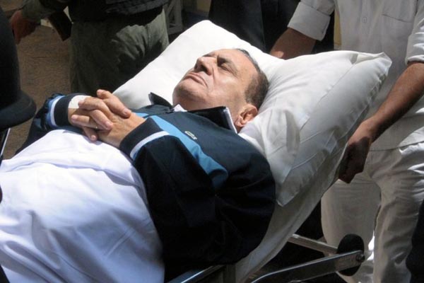 Hosni Mubarak flown to court for retrial