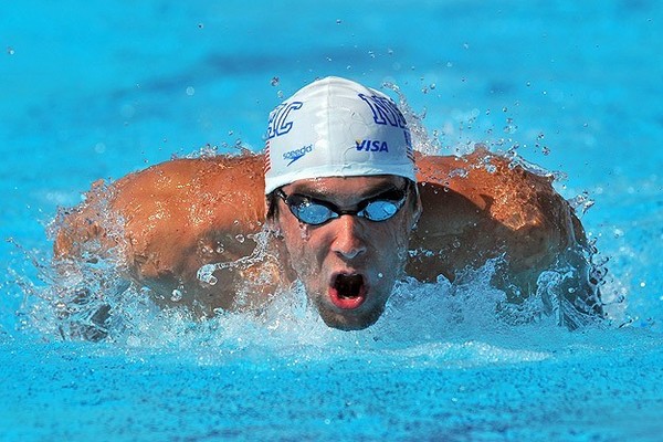 Phelps became the first Olympic swimmer to win four consecutive gold medals in the same event