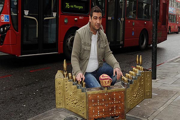 Turkish shoe polisher wins visa lawsuit against England