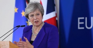 Theresa May vows to continue with her Brexit deal