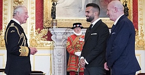 Turkish Cypriot Mete Coban received an MBE from Prince Charles